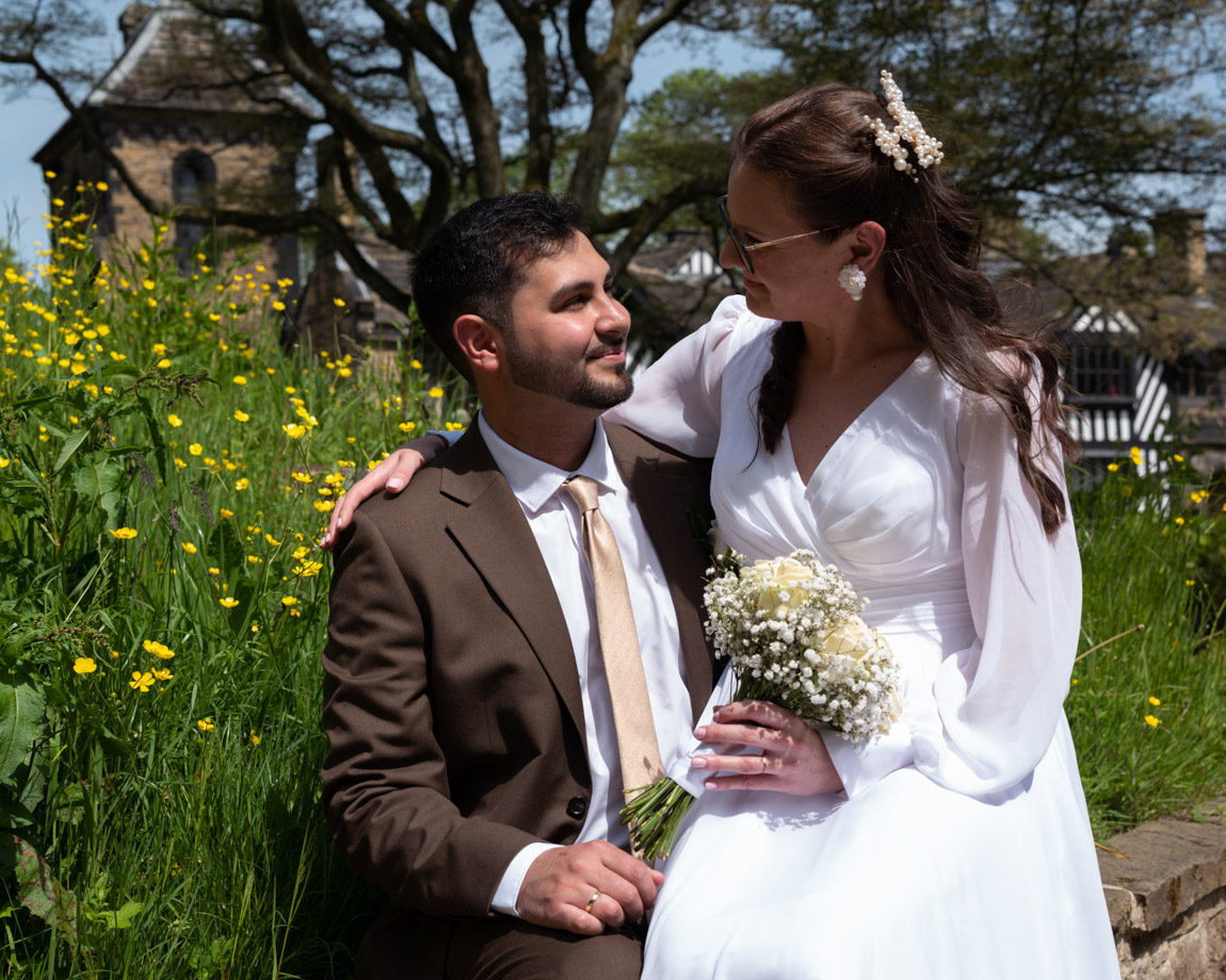 A beautiful colour couple portrait taken at Shibden Park - Inga and Roland relaxed and themselves. Comfortable portraiture by an experienced Leeds wedding photographer in Halifax.