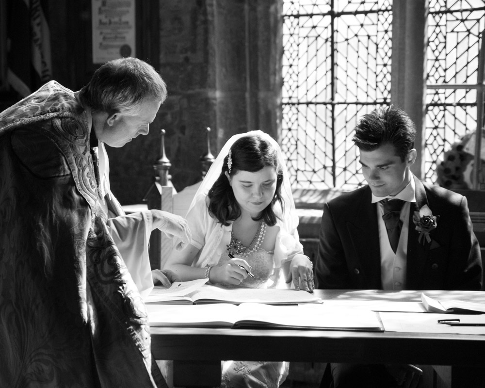An April wedding at Halifax Minster captured by a Leeds wedding photographer - Claire and Tom's wedding story that was truly an adventure in Halifax.