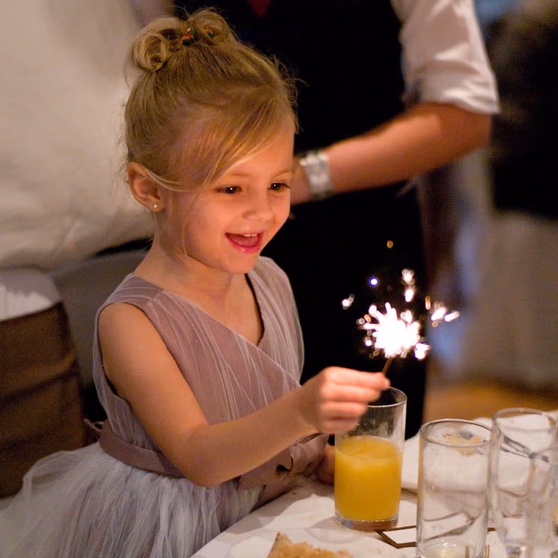 Bridesmaid with a sparkler captured by Leeds Wedding Photographer