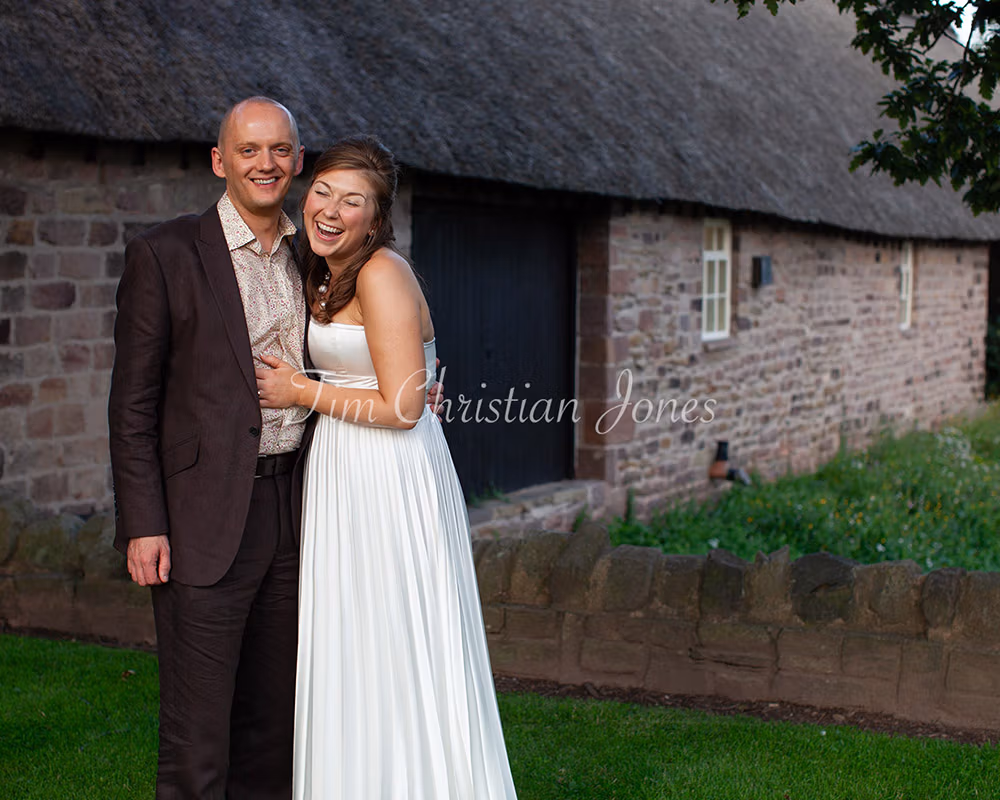 VIllage hall wedding reception, natural couple portraiture by a talented Leeds wedding photographer.