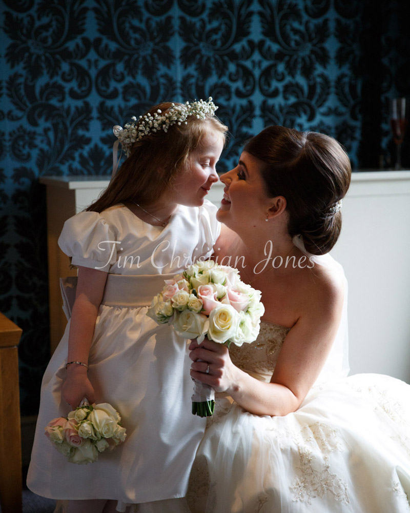 Beautiful colour photo of the bride with her daughter nose to nose