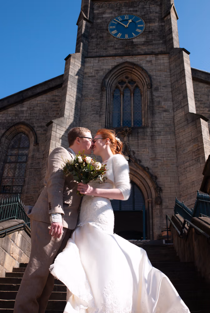 Catherine and Philip on the steps of St George's, Leeds &mdash; Leeds wedding photography