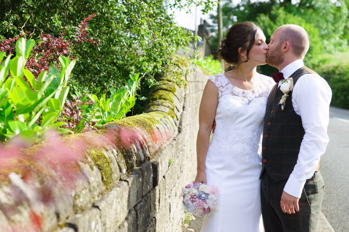 Couple portrait opposite the Woodman Inn photographed by Tim Christian Jones a Leeds wedding photographer in Huddersfield.