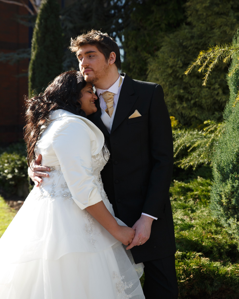 Zehra and Richard couple portrait at Crowne Plaza Leeds garden area