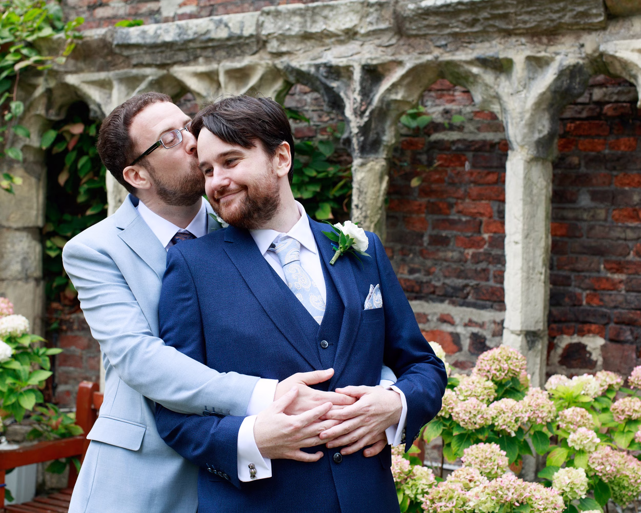 Pre ceremony portraits before the rain - Chris & David by the old chuch at the rear of the hall