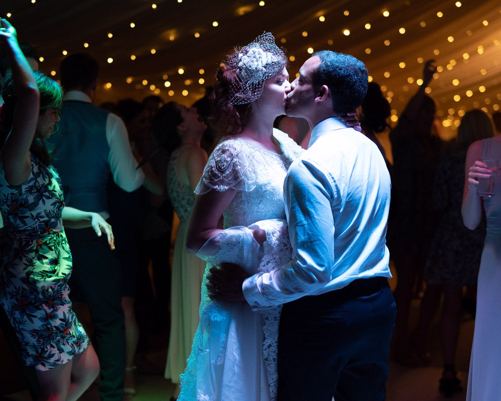 Leeds wedding photography - The first dance in colour - Naz & Dunc. Captured using available light to reflect the ambience and memory perfectly.