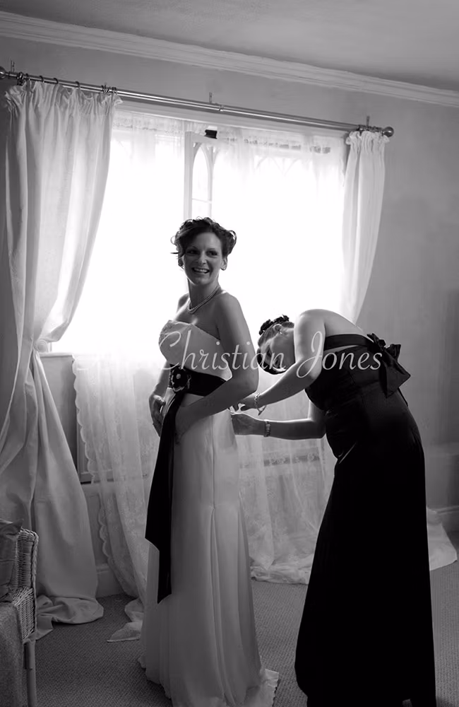 Bride in her dress in monochrome and natural light by a Leeds-based Documentary wedding photographer