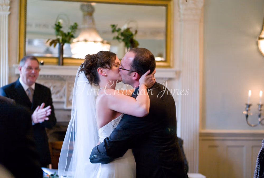 The couple’s first kiss — tender, unhurried, full of feeling.
