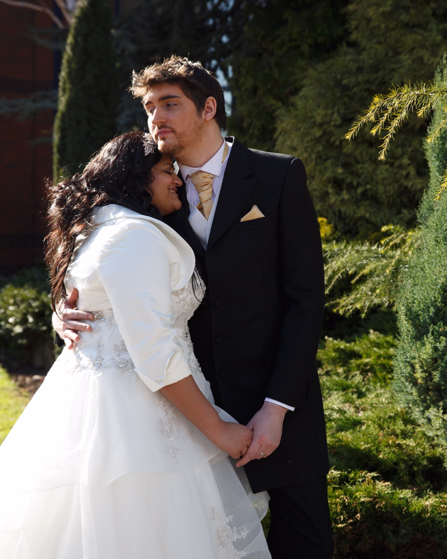 Zehra and Richard couple portrait at Crowne Plaza Leeds garden area