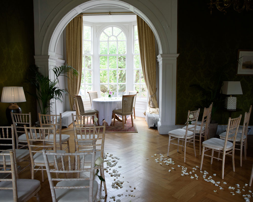 Grays Court Hotel York Wedding Photography — Ceremony room calm and ready with flower petals lining the aisle.