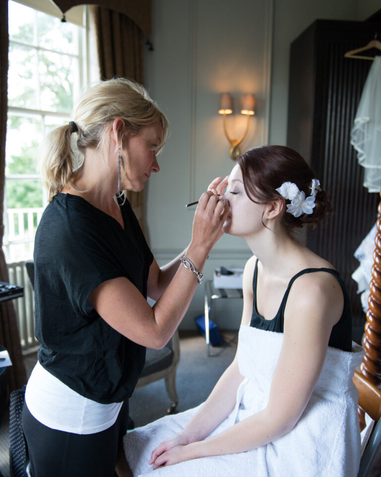 Wood Hall Hotel wedding prep moment captured by a Candid & Documentary wedding photographer Tim Christian Jones
