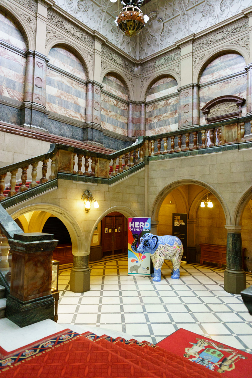 Ornate interior of Sheffield Town Hall with rich colours and historic details