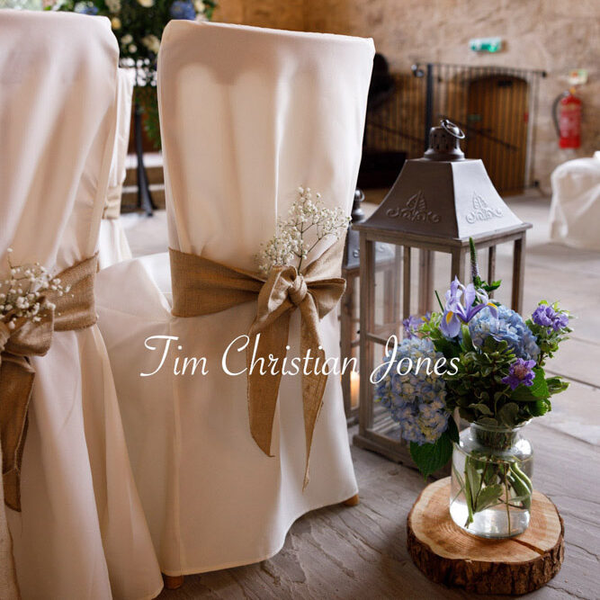 Wedding ceremony setup with floral and ribbon details at The Priests House, Barden Tower.