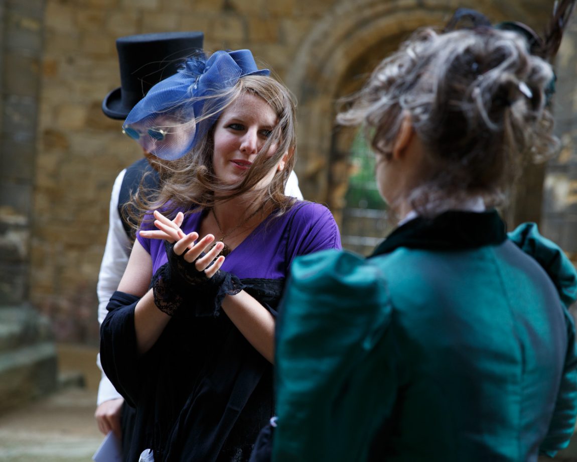 002 grooms mum greets guest in bold blues kirkstall abbey wedding linsey and chris