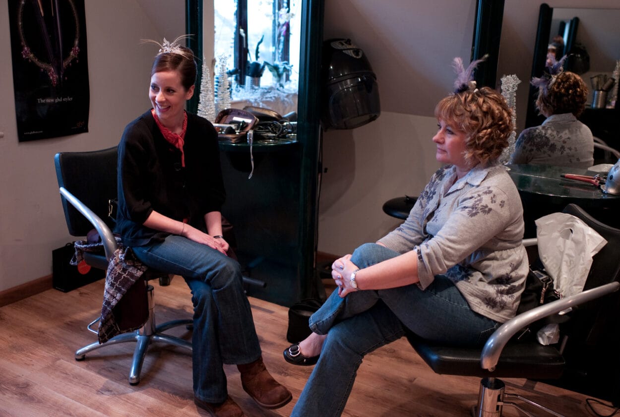 A wide smile from Emelie as her wedding morning unfolds.