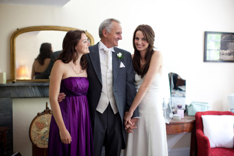 bride, sister and father - posed naturally - Leeds Destination wedding photographer