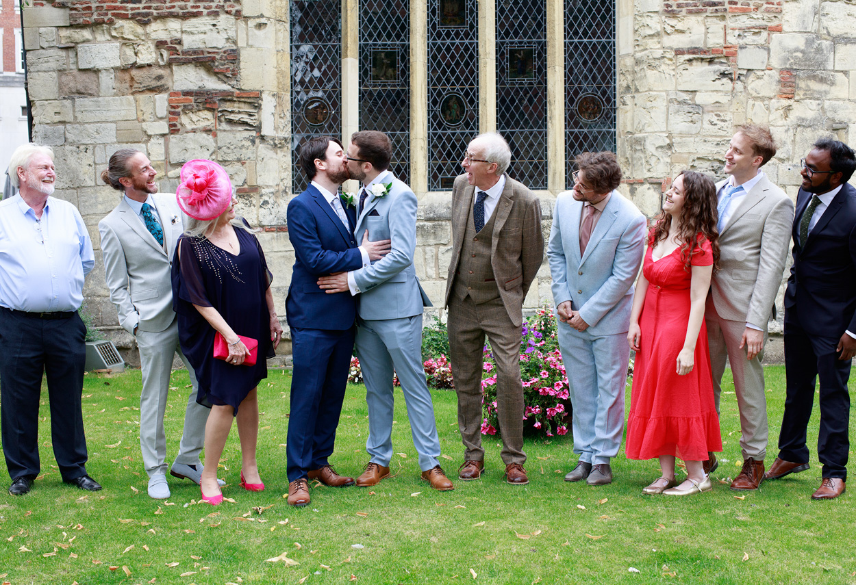Large family portrait in front of the grand church window at the rear of Merchant Adventurers’ Hall.