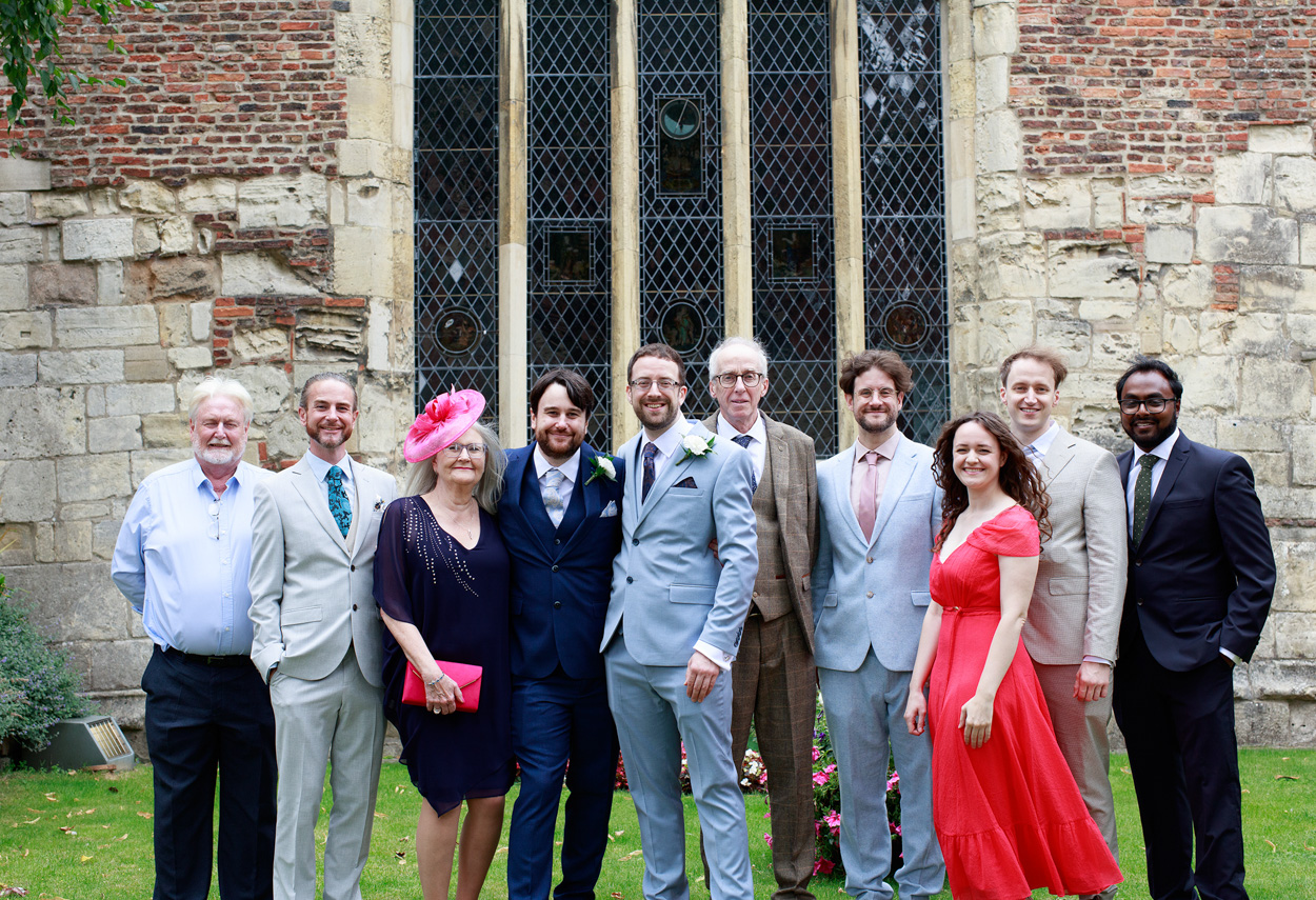 Family group portrait with everyone facing forward and smiling at Merchant Adventurers’ Hall.