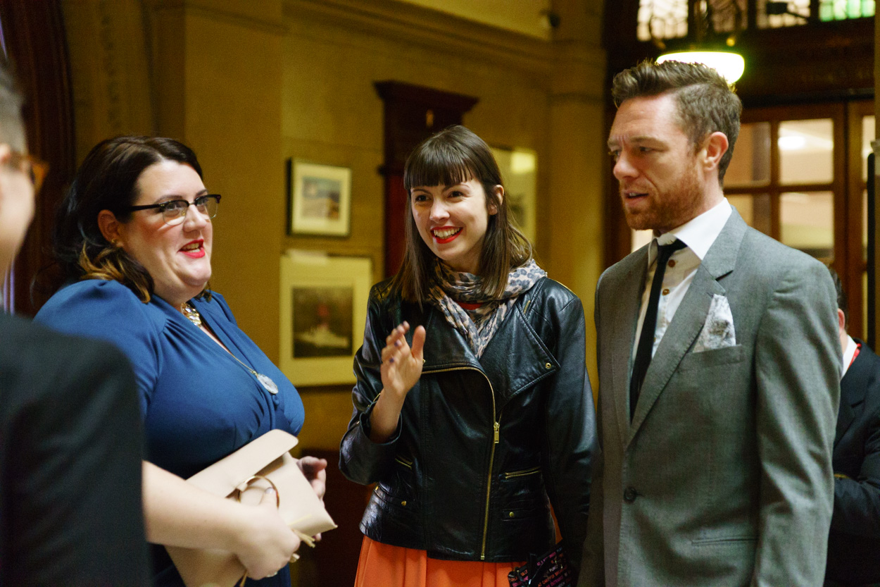 Expressive candid moments of guests inside the ceremony space
