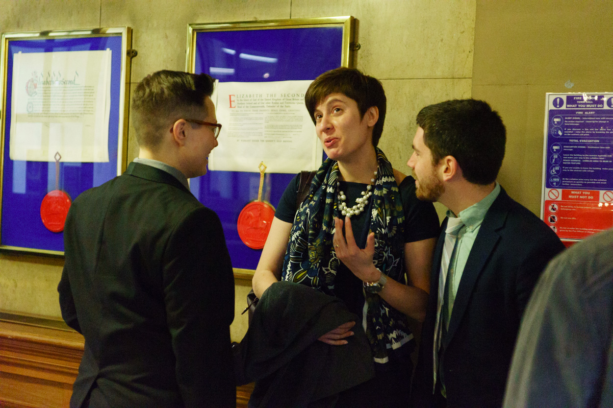 Tamara chatting happily with friends inside the stone interior