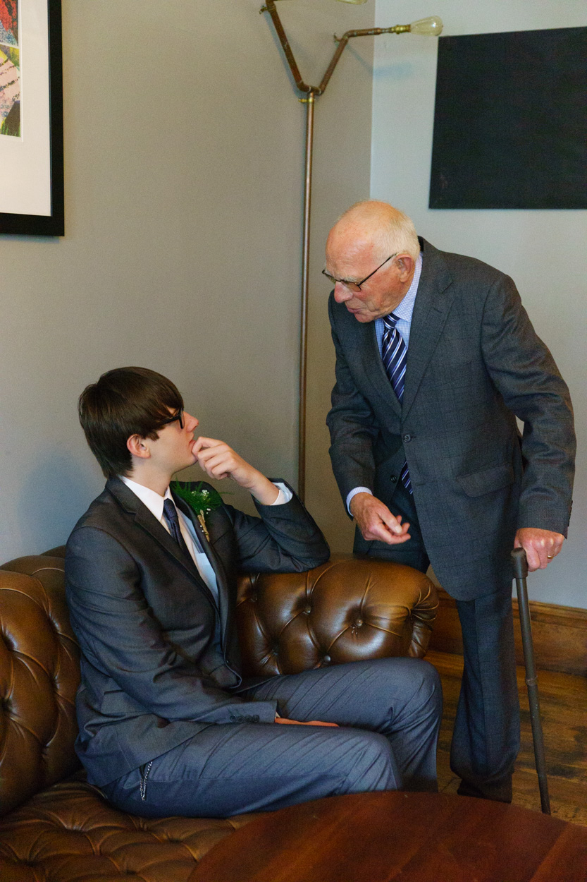 Wedding guests of different generations chatting together
