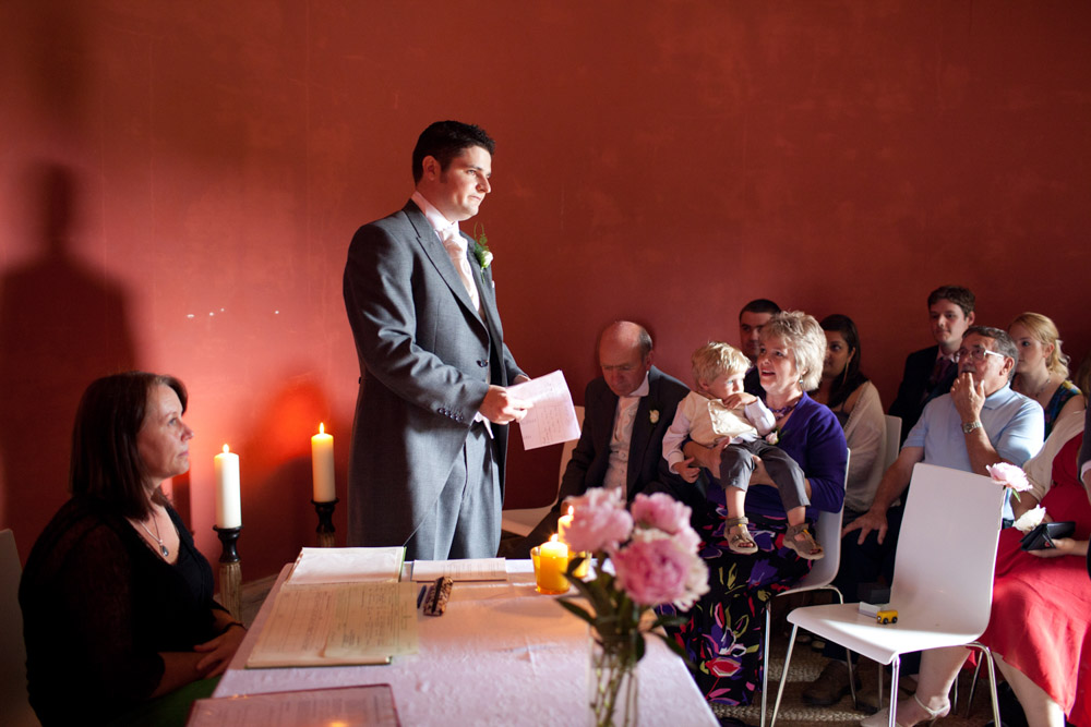 Best man reads a heartfelt passage during the ceremony at the Temple of Apollo