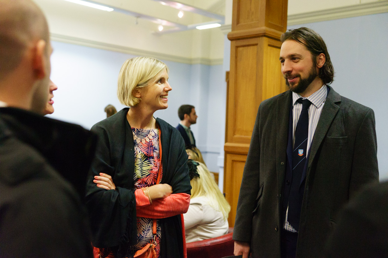 Guests mingling inside the pastel blue ceremony room at Sheffield Town Hall
