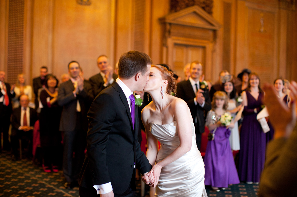 The couple sharing the first of two kisses during the ceremony.