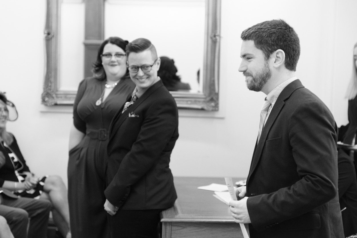 Guests reacting with smiles to the reading