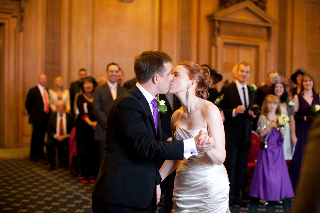 The couple sharing a second, spontaneous first kiss during the ceremony.