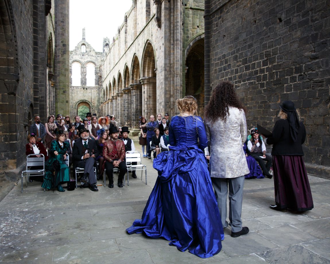 032 bride and groom stood together at the start of the ceremony kirkstall abbey wedding linsey and chris