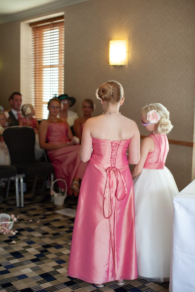 Photo from behind as the couple’s other daughter joins in giving the speech.