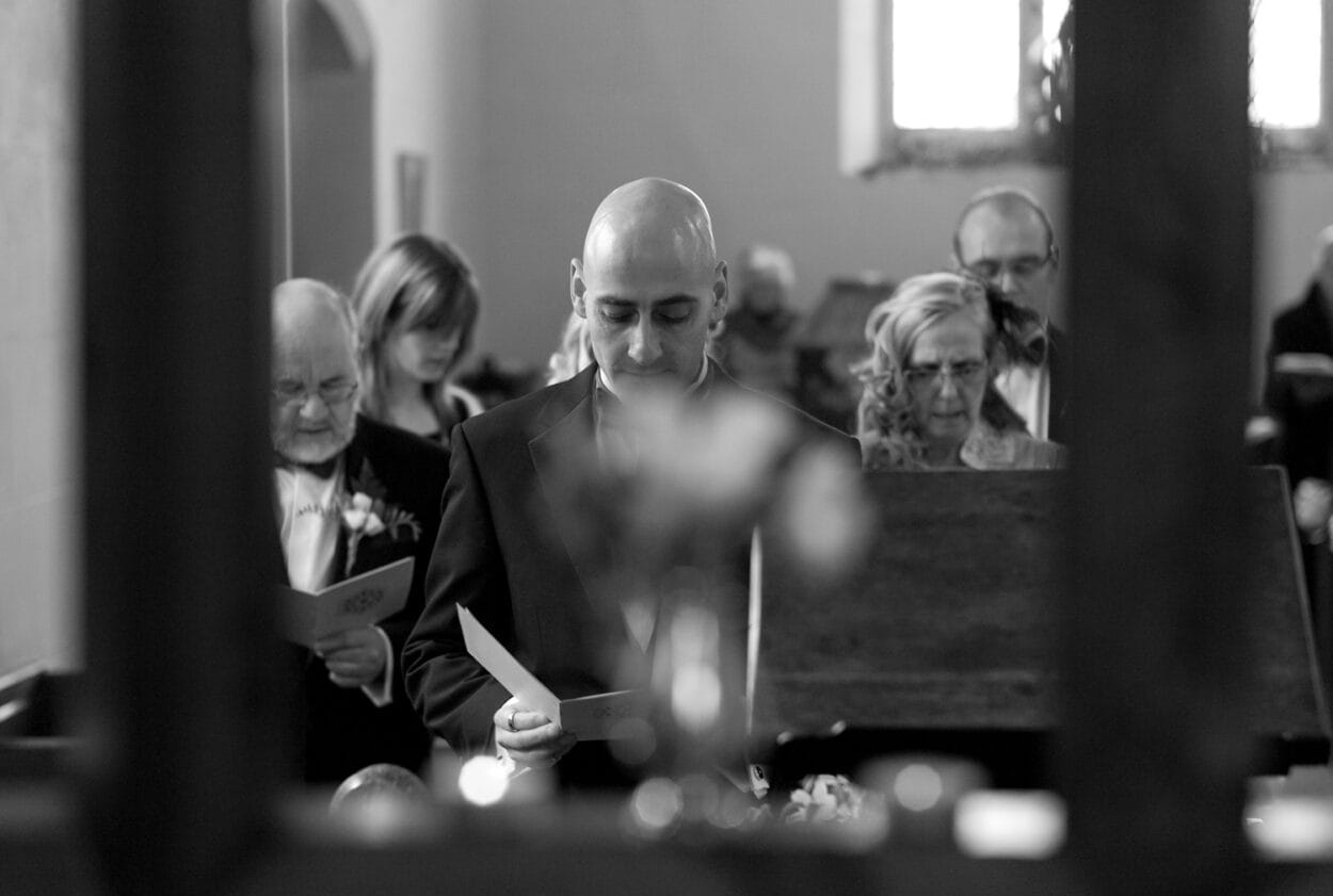 Guests singing with both joyful and serious faces.