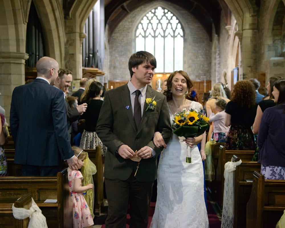039 bride groom exit st michael all angels susie dan