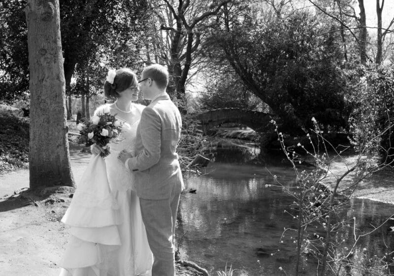 Black and white portrait of a wedding couple at Golden Acre Park in Leeds