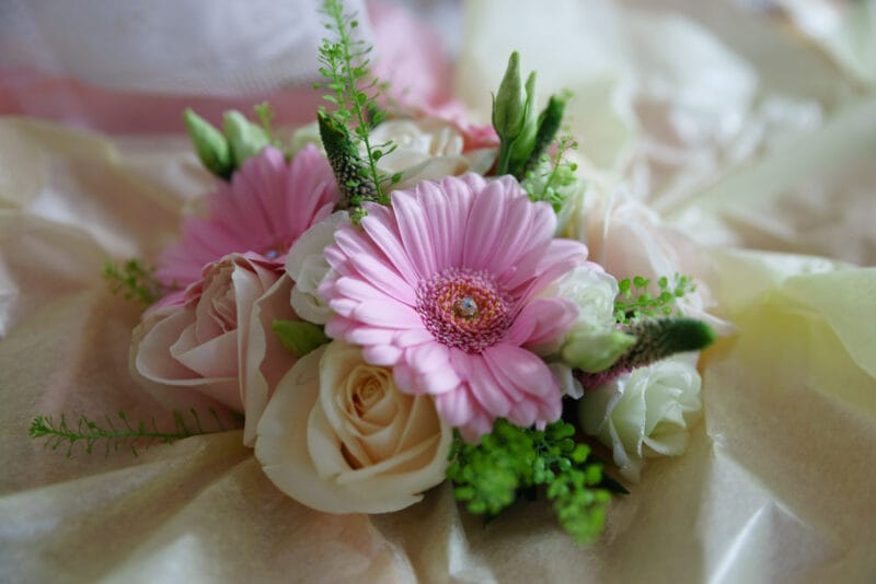 Blush and cream bouquet lit gently by window light