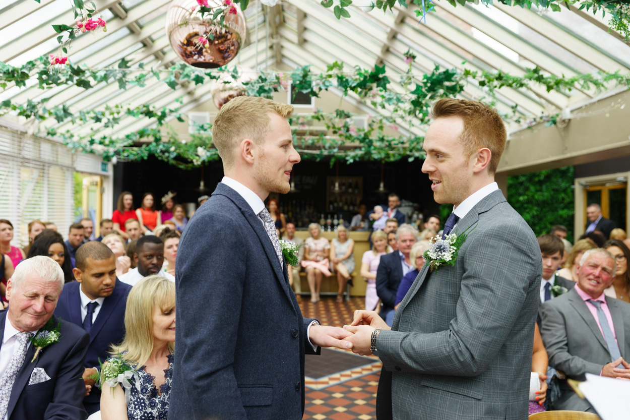 Wedding ring being gently placed during the ceremony