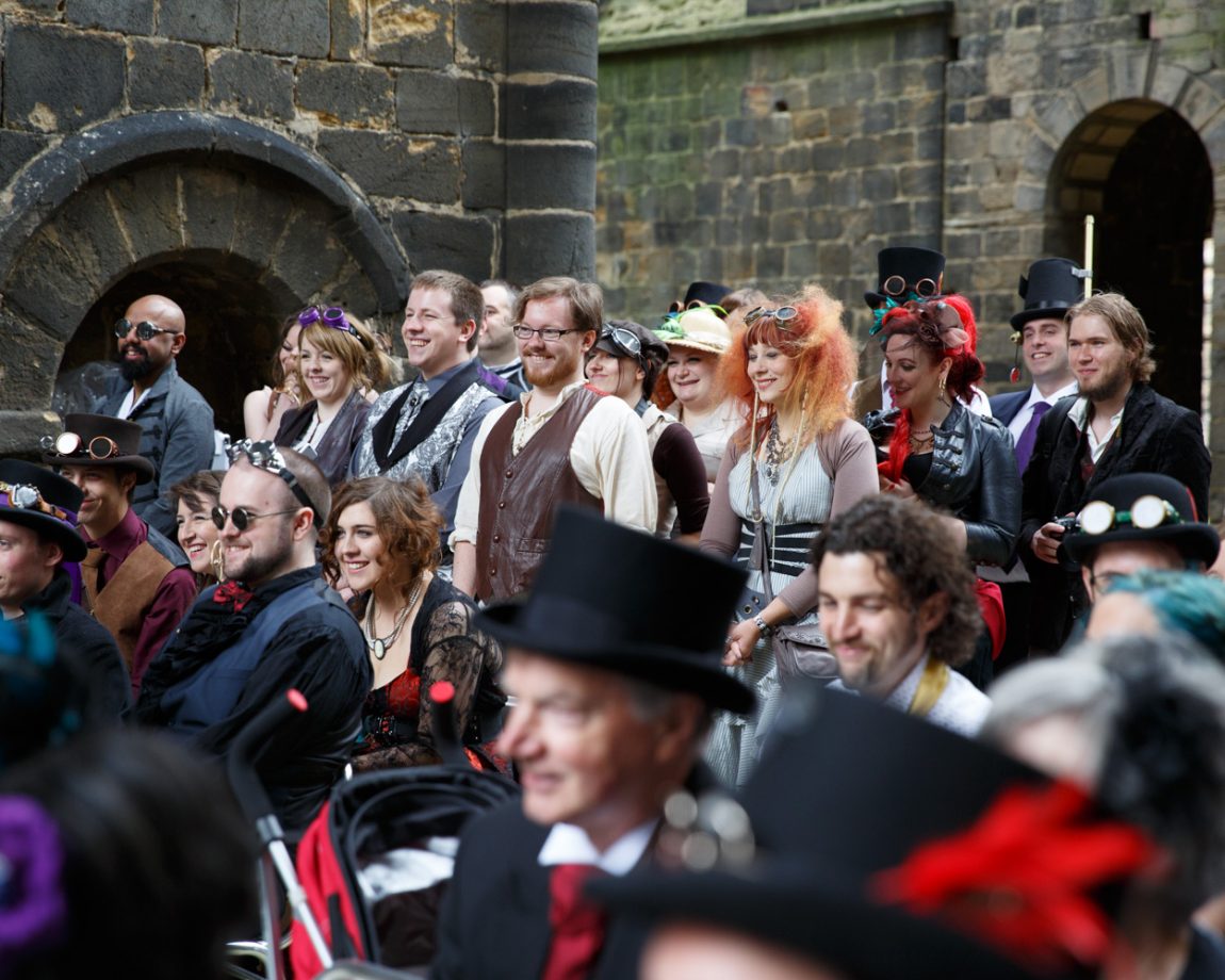 041 guests sat and stood react smiling too kirkstall abbey wedding linsey and chris