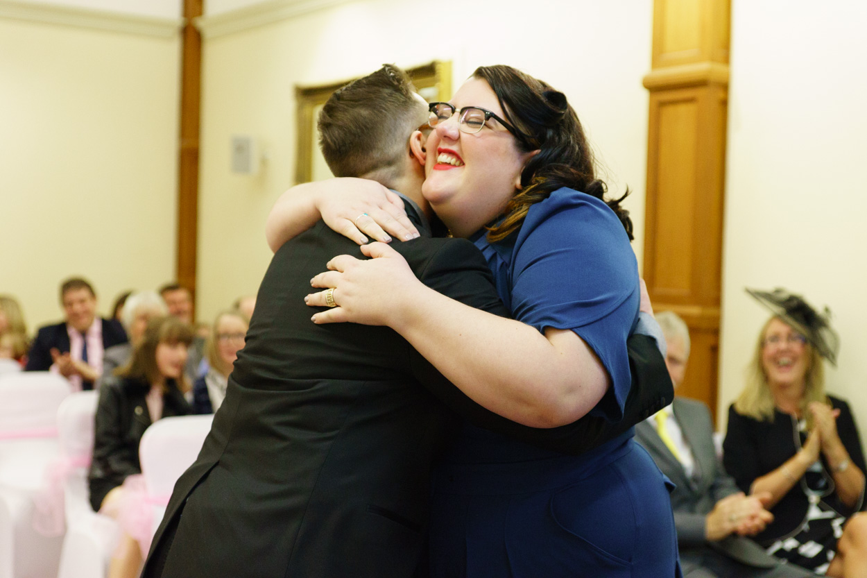 Lizzie and Tamara sharing a big hug after the vows
