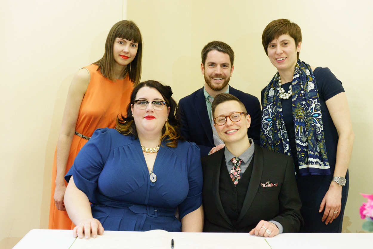 Group turning back toward the camera smiling