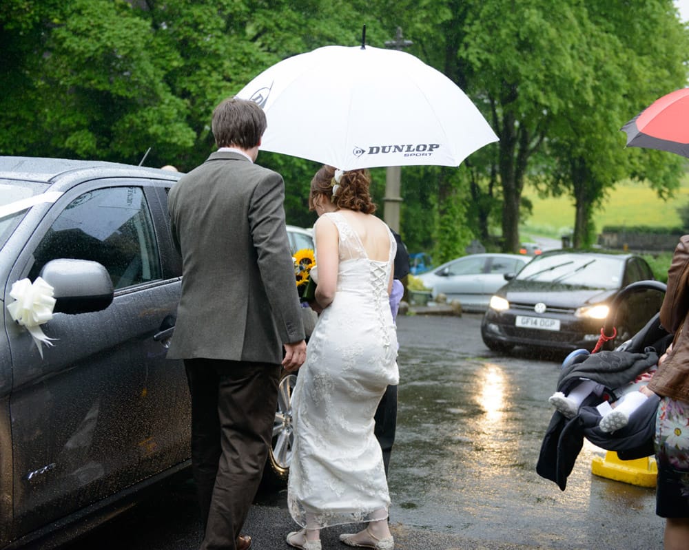 050 wedding car umbrellas st michael all angels susie dan