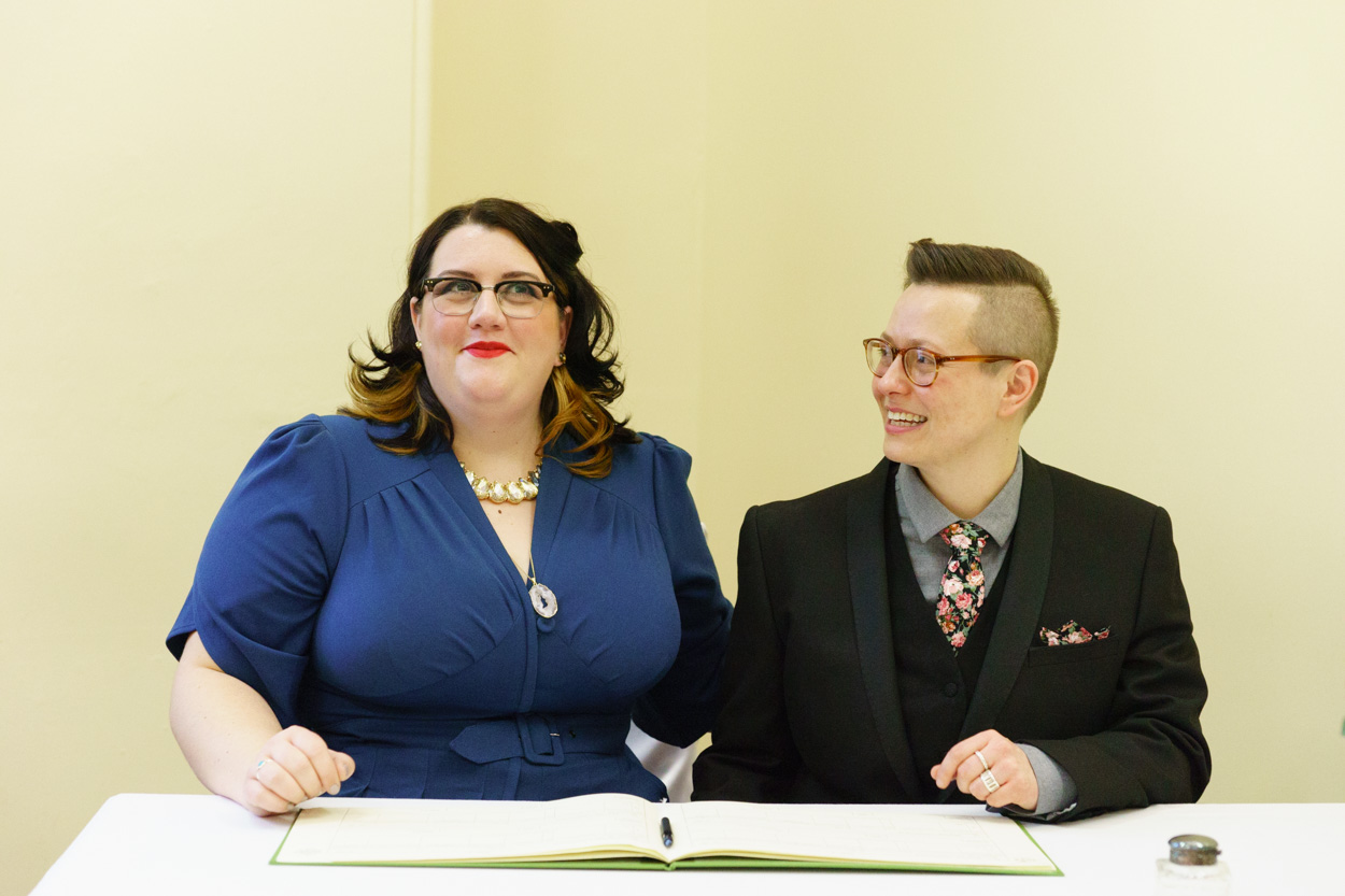 Lizzie and Tamara posing together for friends after the ceremony