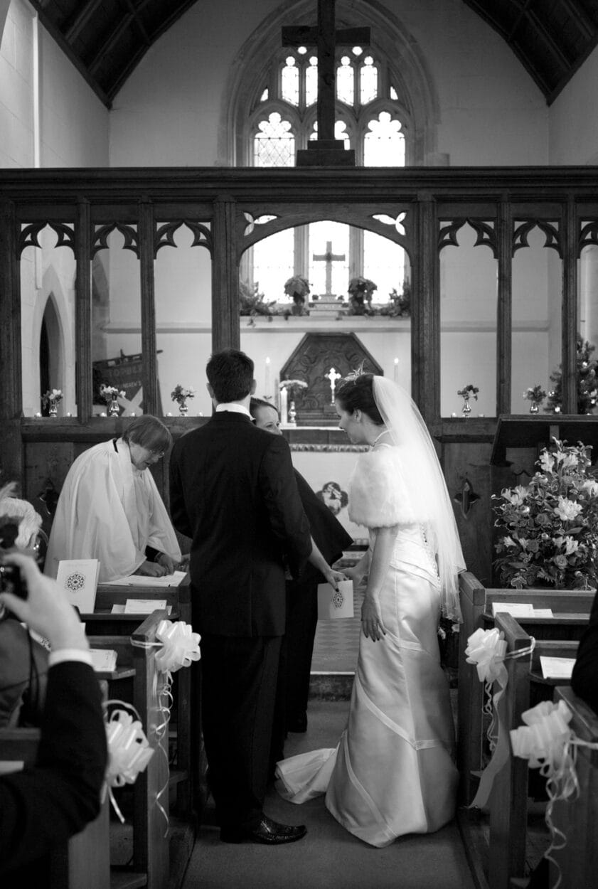 Emelie and her sister share a smile at the register table.