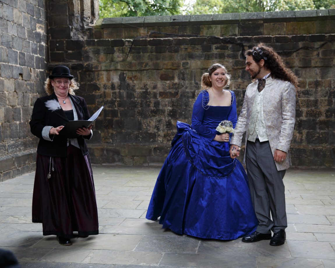 056 registrant announces the ceremony is complete the couple smile widely kirkstall abbey wedding linsey and chris