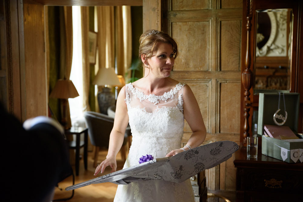 Bride opens a sweet present from her schoolchildren.