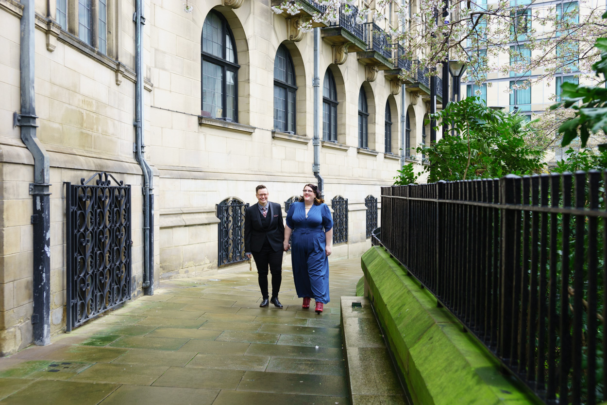 Wider view of Sheffield Town Hall glowing in damp spring light
