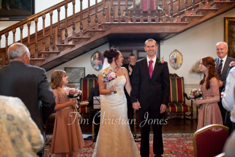 061 couple walk down aisle walcot hall wedding ella and alex