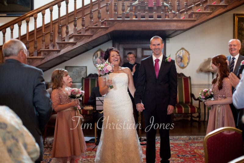 062 couple walk down aisle walcot hall wedding ella and alex