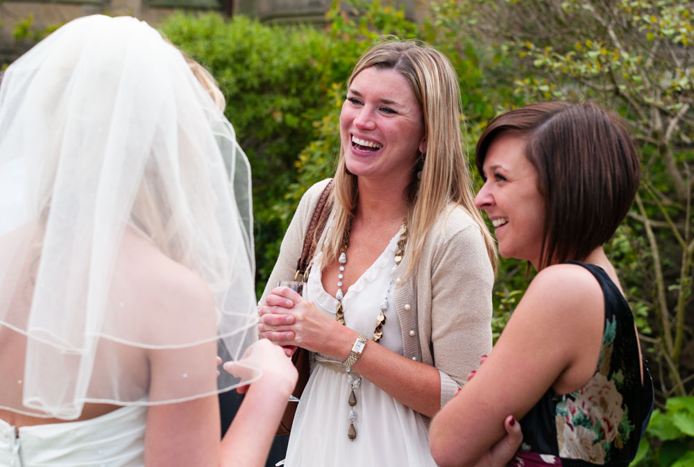 Close friends warmly greeting Vicky in the garden at Allerton Castle