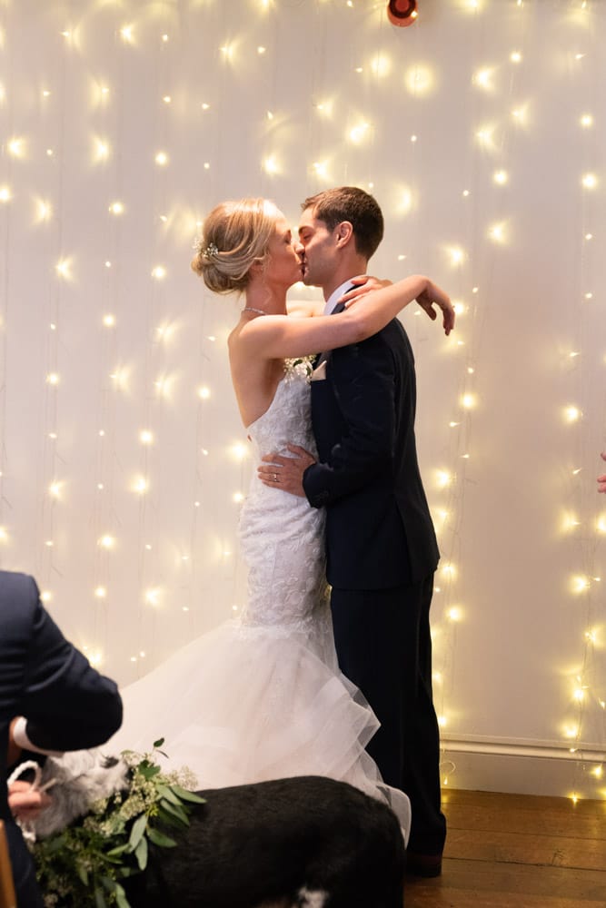 The couple share their first kiss as newlyweds.